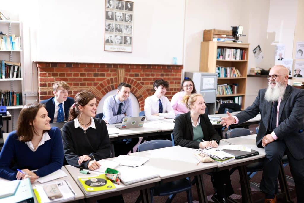 Teacher engaging with pupils