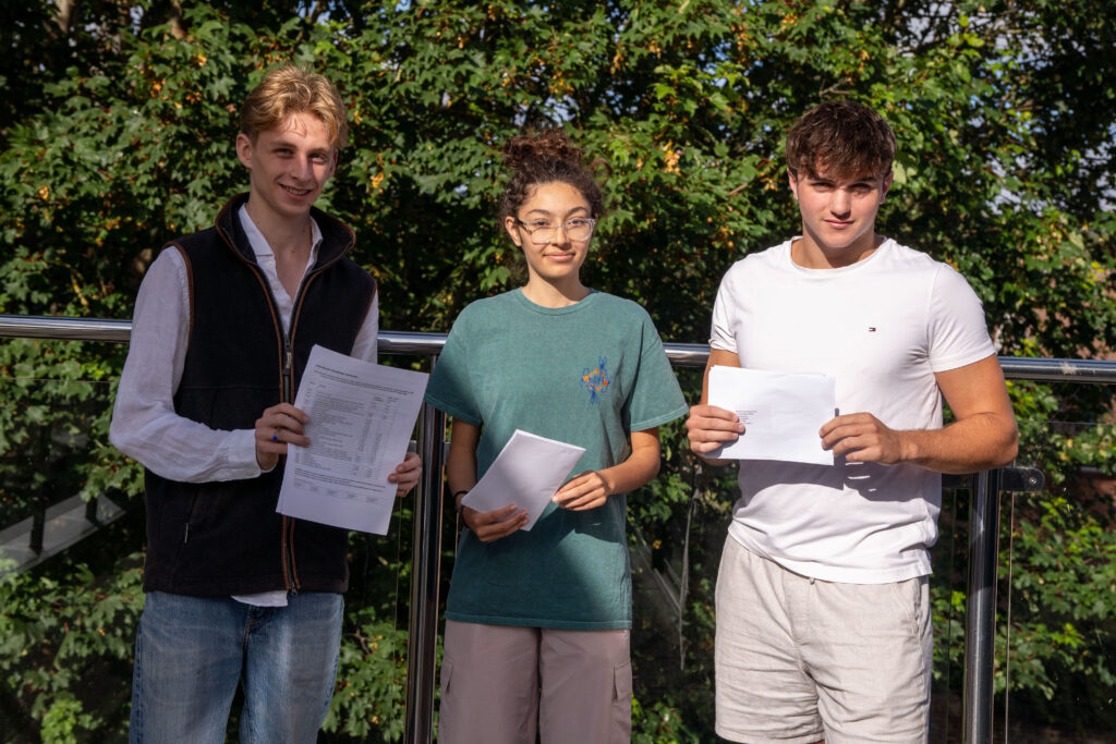 Pupils celebrating a level results